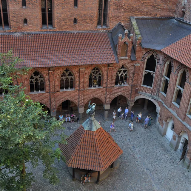 The arcaded courtyard of the High Castle at Malbork seen from above
